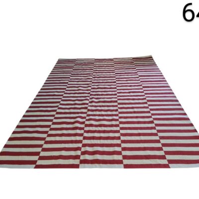 Red and white striped kilim rug is handmade with wool for rent for events, advertising, films and series.