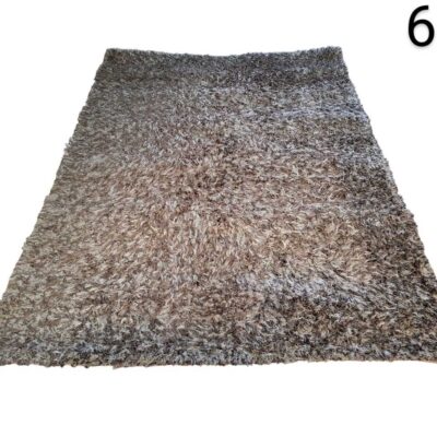 Safavieh Paris Shag chocolate carpet with long pile texture for rent for events, advertising, movies and series.