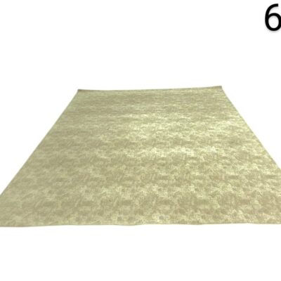 Hand-woven beige turkish carpet with a subtle texture for rent for events, advertising, films and series.