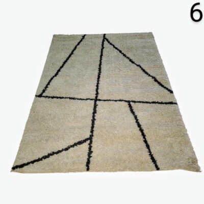 JYSK carpet ODON in cream colour with black geometric design for rent for events, advertising, movies and series.