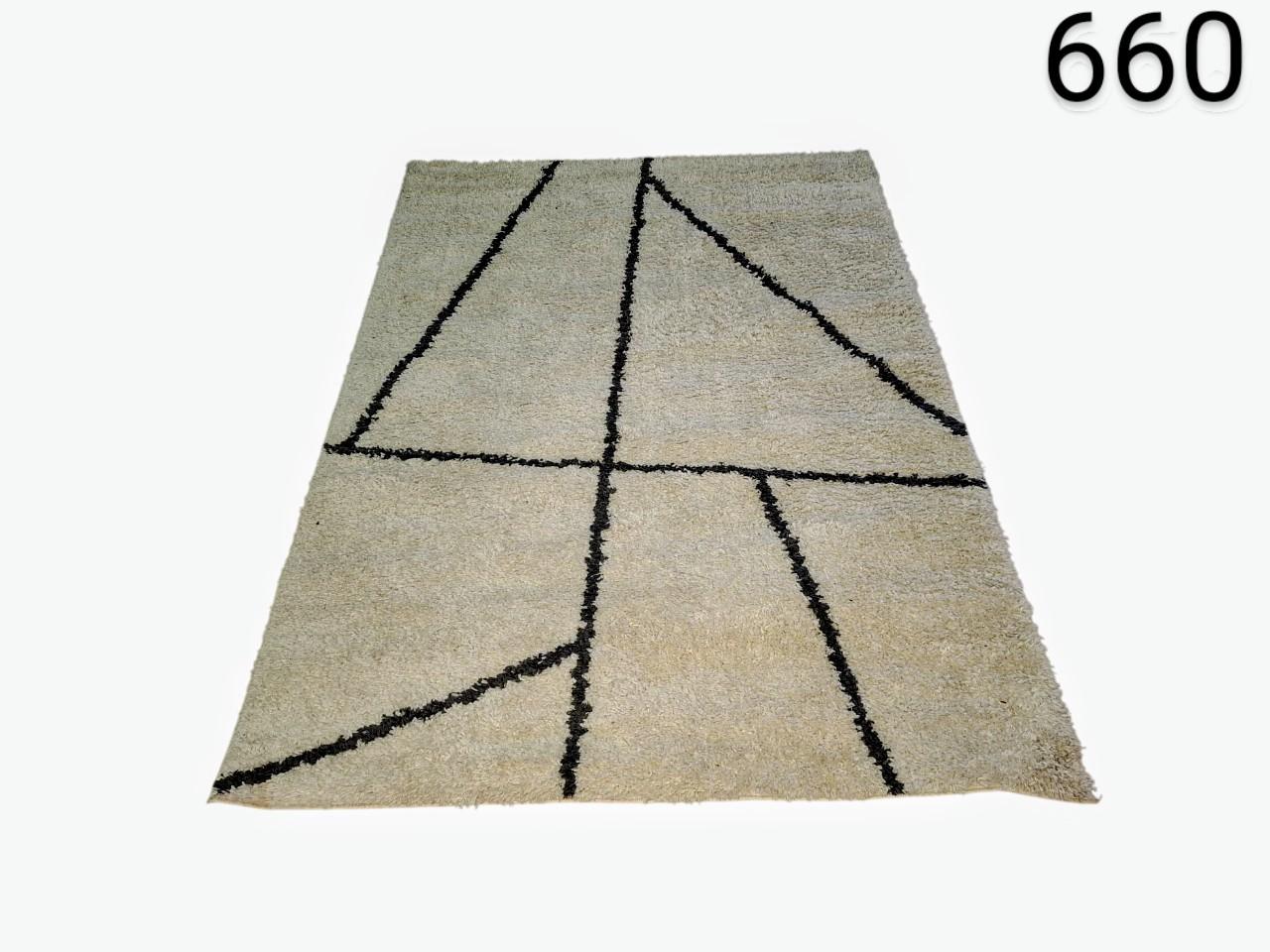 JYSK carpet ODON in cream colour with black geometric design for rent for events, advertising, movies and series.
