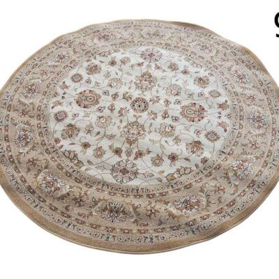 Round Tabriz style rug with intricate floral patterns in beige and brown tones for rent for events, advertising, films and series.