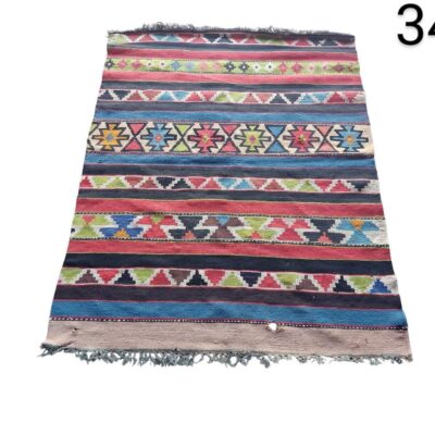 Alfombra Kilim vintage de lana tejida a mano con patrones geométricos coloridos alquiler para eventos, publicidad, peliculas y series