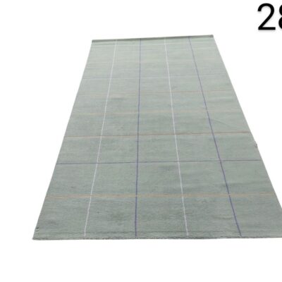 Alfombra Normann Copenhagen Seam de color gris con un diseño de cuadrícula alquiler para eventos, publicidad, peliculas y series