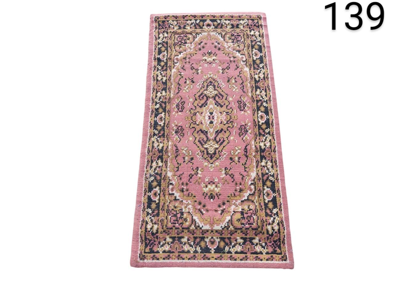 Turkish vintage wool Oushak carpet with a detailed floral pattern in shades of pink, yellow and grey for rent for events, advertising, films and series.