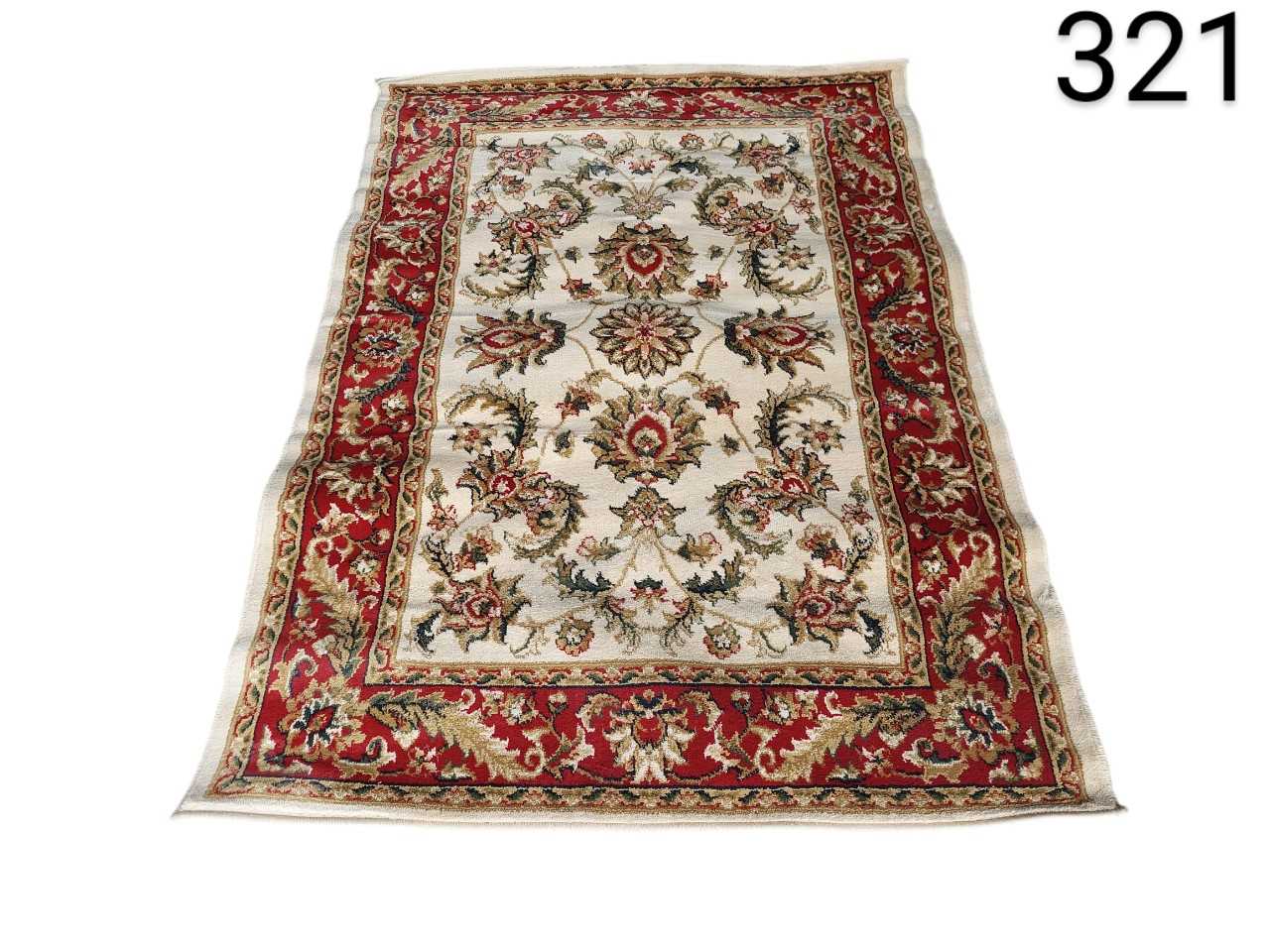 Classic oriental style carpet with floral design in beige and maroon tones for rent for events, advertising, films and series.