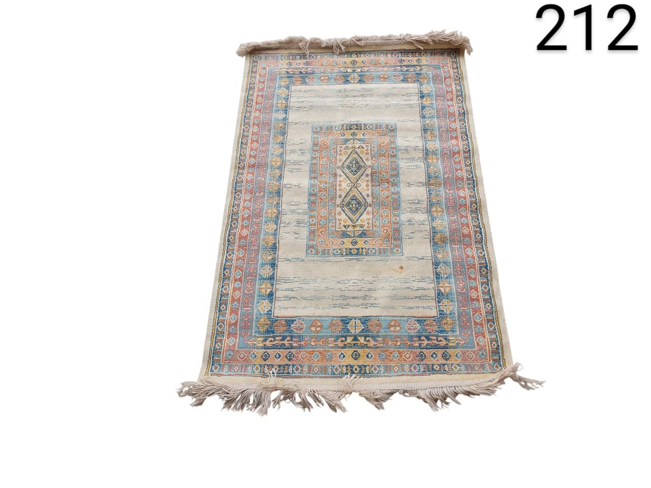 Oushak style area rug with a faded vintage design for rent for events, advertising, films and series.