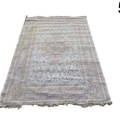 Vintage or Victorian design rug in neutral tones such as light grey, cream and beige, with intricate floral or geometric patterns for rent for events, advertising, films and series.