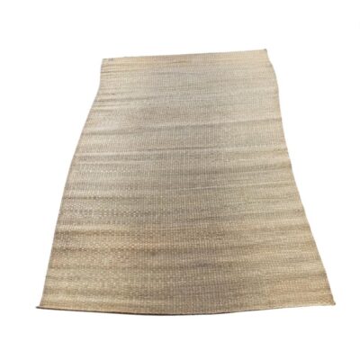 Rectangular rug made of beige natural jute fibre with a rustic braided weave for rent for events, advertising, films and series.