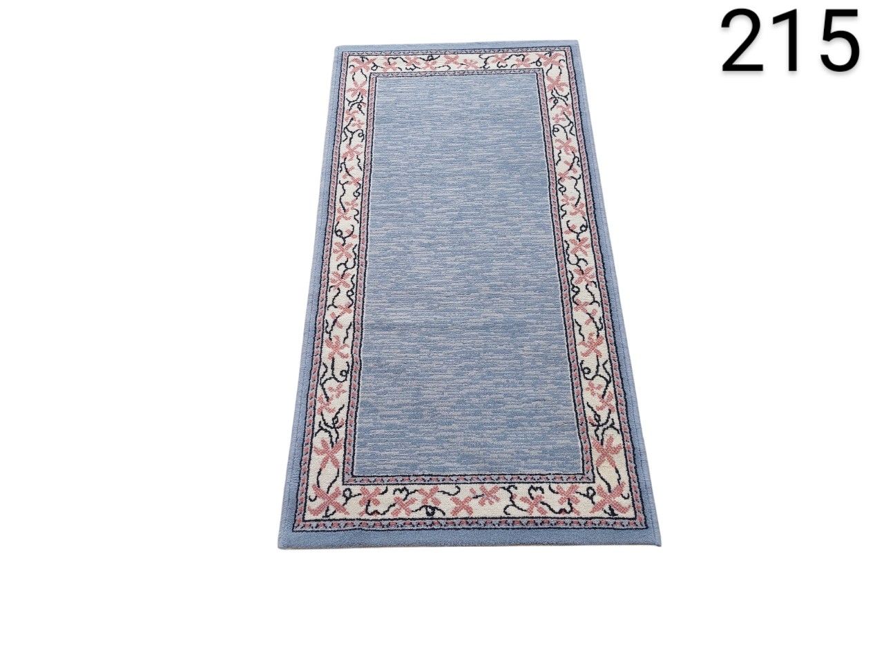 Hallway rug from the Laury Multicolour collection with a floral border design for rent for events, advertising, films and series.