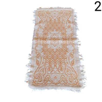 Alfombra de pasillo beige y naranja con diseño floral y flecos alquiler para eventos, publicidad, peliculas y series