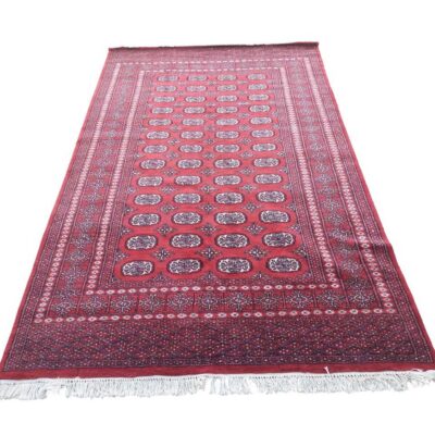 Carpet is a classic example of a traditional Bokhara design, characterised by its intense red colour and repetitive geometric patterns, rented for events, advertising, films and serials.