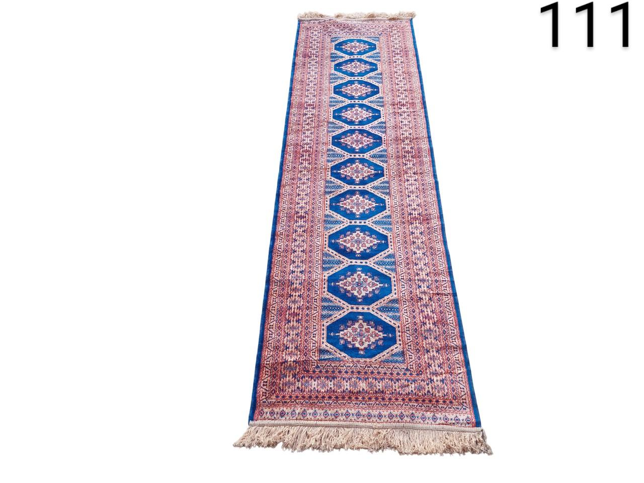 Handmade Persian Yalameh style runner rug with blue and red geometric patterns for rent for events, advertising, movies and series.
