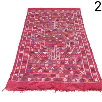 Alfombra kilim afgano turcomano de lana hecho a mano, caracterizado por su tejido plano y patrones geométricos alquiler para eventos, publicidad, peliculas y series