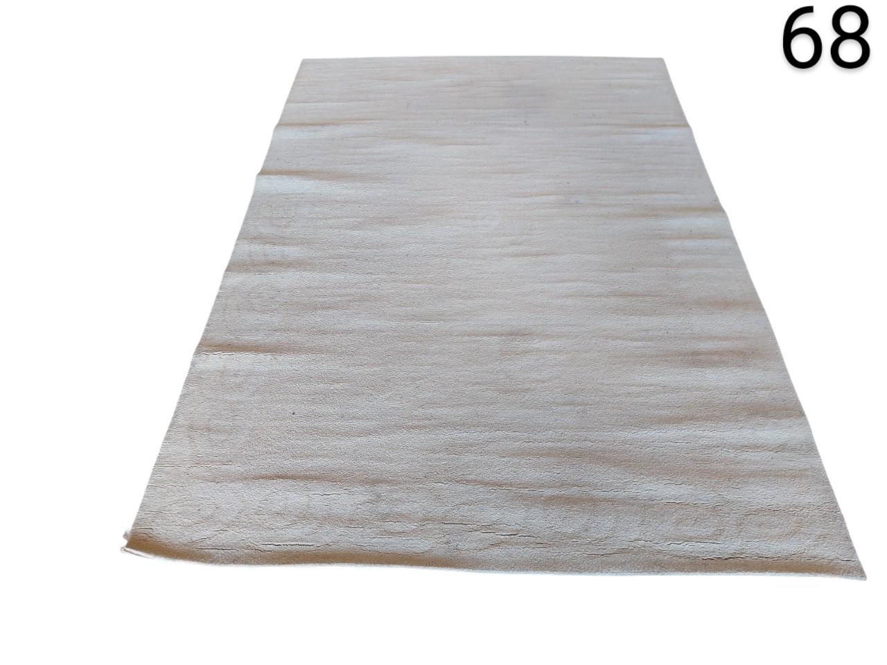 Modern neutral beige carpet with a subtle texture for rent for events, advertising, films and series.