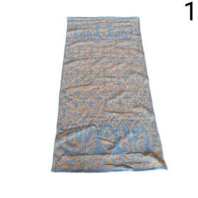 Alfombra pashmina de lana fina con un diseño jacquard en tonos azul y dorado alquiler para eventos, publicidad, peliculas y series