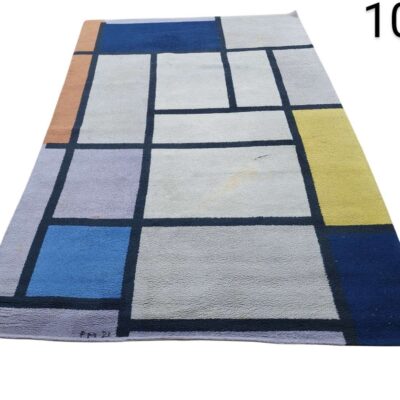 Alfombra inspirada en la "Composición con rojo, azul, negro, amarillo y gris" de Piet Mondrian, producida por Ege Axminster como parte de su colección Masters del siglo XX. alquiler para eventos, publicidad, pelicula y series
