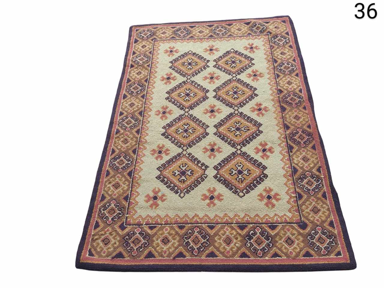 Shiraz type rug, hand knotted in India with tribal geometric motifs, for rent for events, advertising, films and series.