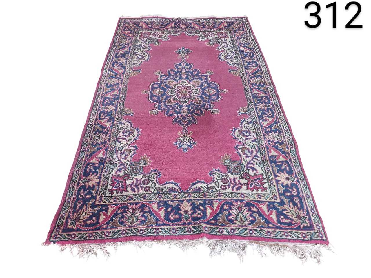 Carpet is a vintage piece from Turkey, possibly from the region of Sparta or Oushak for rent for events, advertising, films and series.