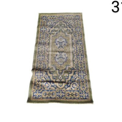 Vintage hand-woven lounge rug in blue and green tones, possibly of Turkish origin, for rent for events, advertising, films and series.