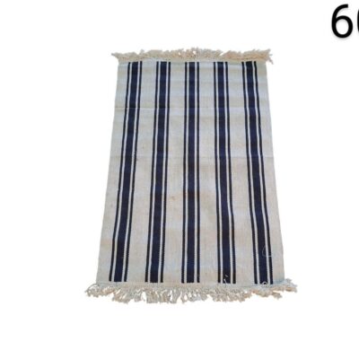 Traditional cotton carpet with navy blue and beige vertical stripes, finished with fringes at the ends, for rent for events, advertising, films and series.
