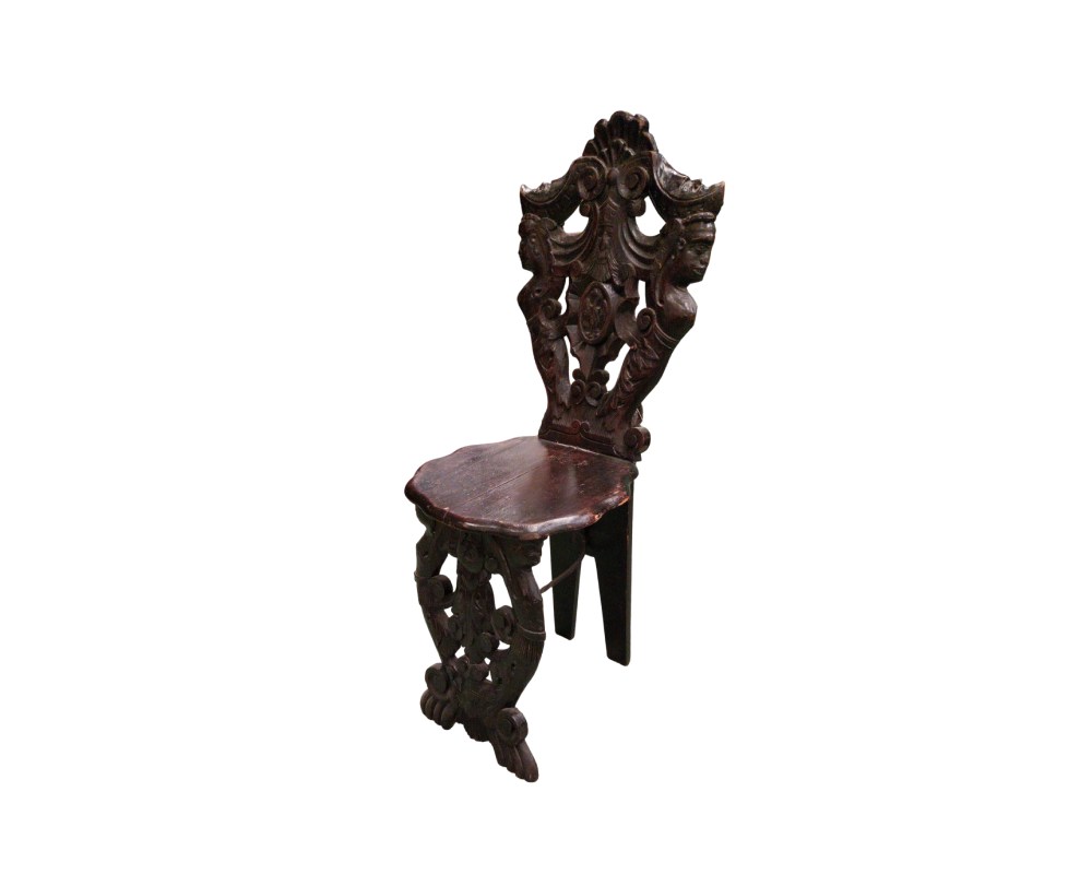 This Italian Renaissance-style stool is crafted from wood carved with silhouette figures on the backrest; available for hire for events, advertising, films and TV series