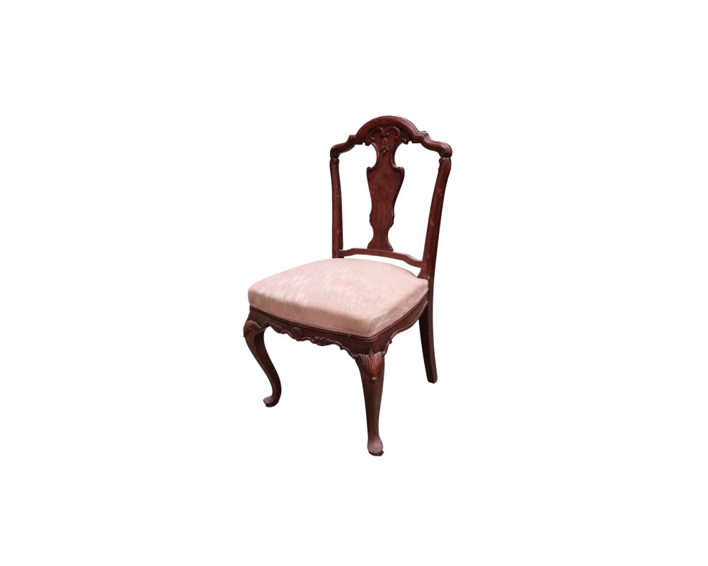 This Queen Anne-style dining chair is made from mahogany with decorative carvings and features cabriole legs; available for hire for events, advertising, films and TV series