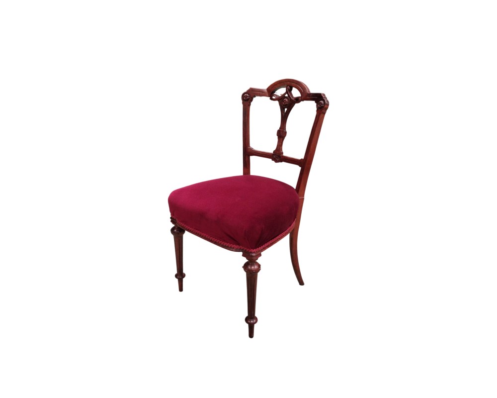 Victorian-style chair with a dark wooden frame and a seat upholstered in red velvet – available for hire for events, advertising, films and TV series