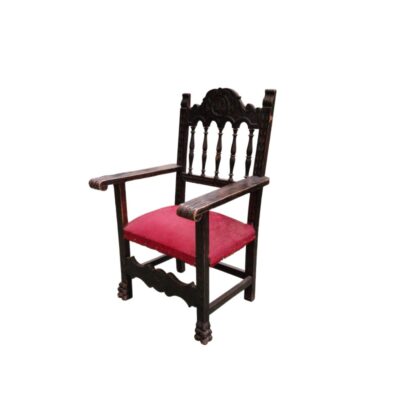 Dark wood friar’s armchair with red upholstery on the seat – available for hire for events, advertising, films and TV series