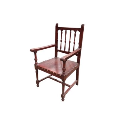 Castilian-style chair with a solid wood frame and an embossed leather seat, available for hire for events, advertising, films and TV series