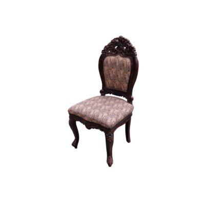 This Baroque-style dining chair from Casa Padrino is made from dark brown beech wood with intricate carved details; available for hire for events, advertising, films and TV series