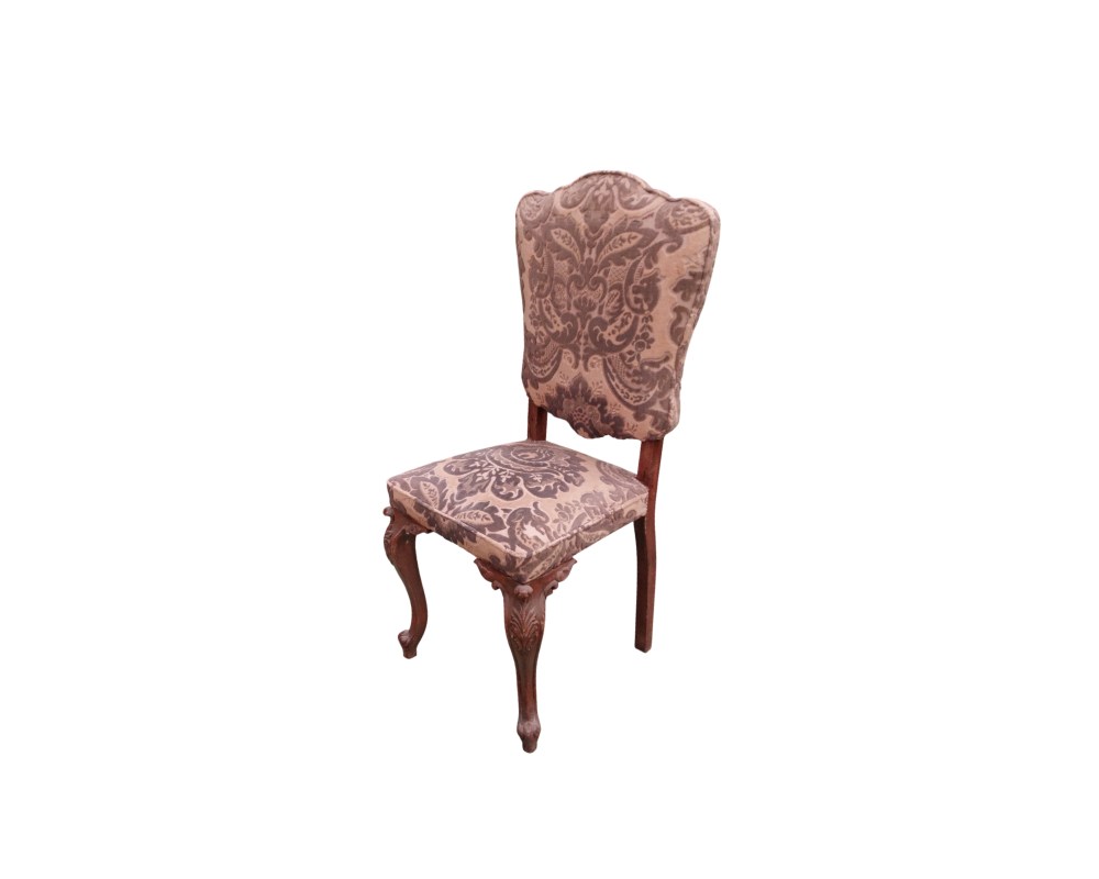 Neo-Rococo-style chair, notable for its carved wooden frame and damask upholstery; available for hire for events, advertising, films and TV series