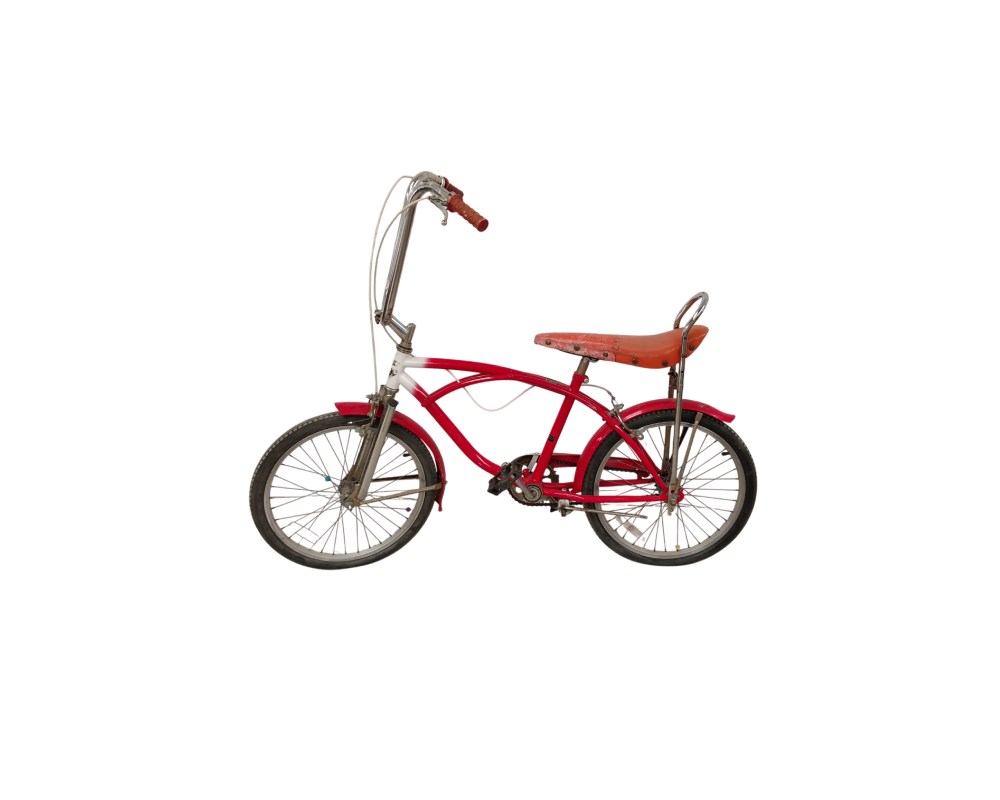 Lowrider-style bicycle featuring an orange banana seat and a red and white frame; available for hire for events, advertising, films and TV series