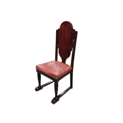 Spanish Renaissance-style chair featuring a carved wooden frame and a seat upholstered in reddish tones; available for hire for events, advertising, films and TV series