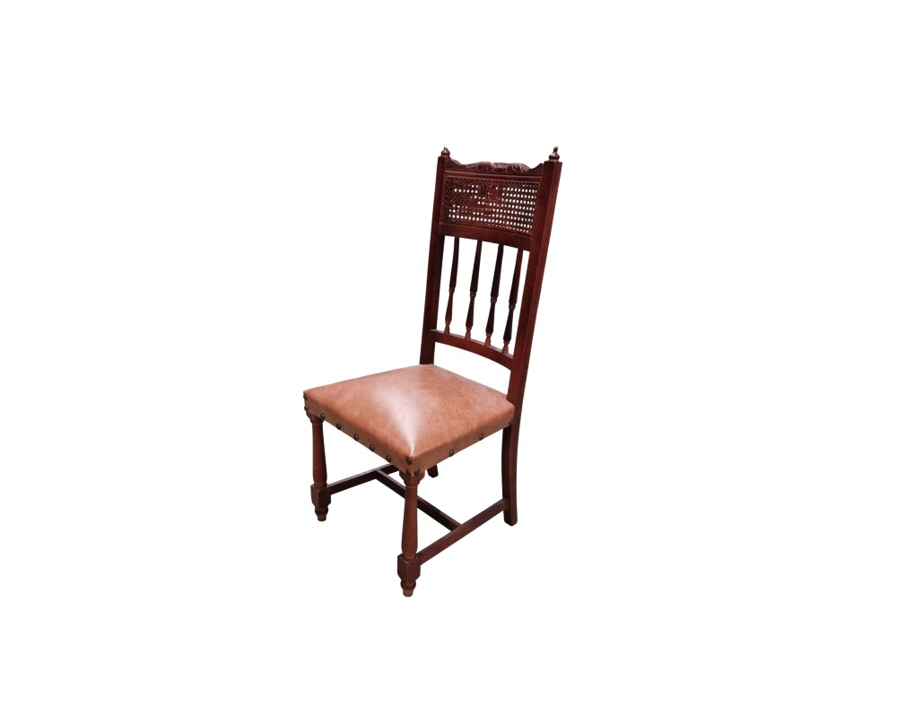 This classic dining chair is made of dark wood with a seat upholstered in faux leather; available for hire for events, advertising, films and TV series
