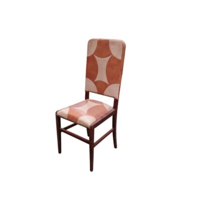 A vintage chair in the French Art Deco style, dating from the 1920s to the 1940s, made of walnut and featuring distinctive geometric leather upholstery in shades of brown and beige. Available for hire for events, advertising, films and TV series.