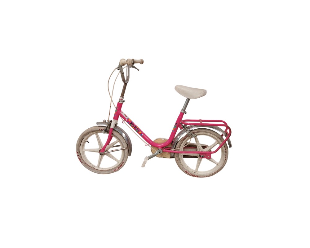 Classic pink BH Happy children’s bike, an iconic model from the 1980s, available for hire for events, advertising, films and TV series