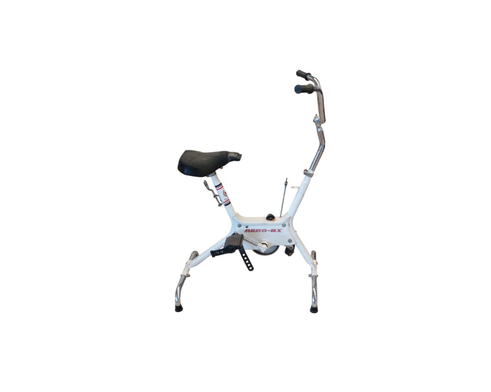 Bicicleta estática BH Aero-BX vintage de los años 90 con un diseño plegable en color blanco alquiler para eventos, publicidad, peliculas y series