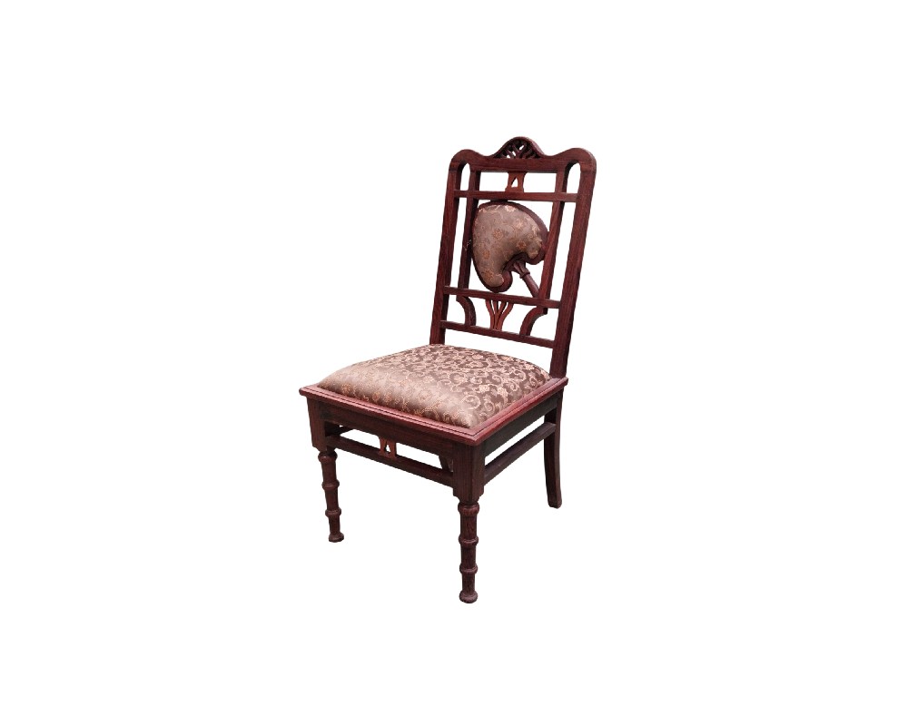Victorian-style chair featuring a carved dark wooden frame and a seat upholstered with a classic floral pattern; available for hire for events, advertising, films and TV series