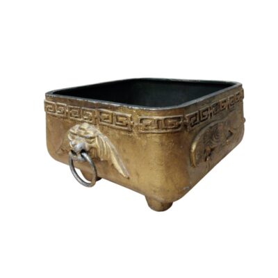 A ceremonial vessel designed for burning incense. It is characterised by its square shape, small legs and an ornamental design inspired by traditional Asian motifs. Available for hire for events, advertising, films and TV series.