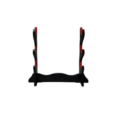 sobremesa en color negro diseñado para exhibir de forma vertical hasta tres espadas u objetos ornamentales de estilo tradicional. alquiler para eventos, publicidad, peliculas y series