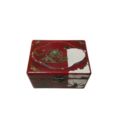 A wooden storage box with a red lacquer finish and painted decoration featuring traditional floral and bird motifs. The chest features a metal latch fastening at the front and shows signs of natural wear and tear on the surface. It is a handcrafted decorative piece, suitable for storing small items, whilst adding a touch of classic, oriental charm to any space.