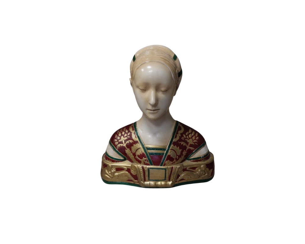 A bust-shaped sculpture depicting a woman with her gaze lowered and her hair tied back, characterised by detailed clothing in shades of red, gold and green featuring floral and geometric motifs; available for hire for events, advertising, films and TV series