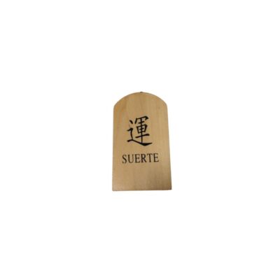 A small, light-coloured wooden plaque, characterised by a rectangular shape with a rounded top and a front surface printed with a traditional ideogram at the top and the word ‘SUERTE’ in capital letters at the bottom; available for hire for events, advertising, films and TV series