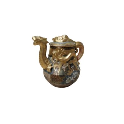 An ornamental teapot with a striking and intricate design. Its most distinctive feature is the spout, sculpted in the shape of a dragon’s head, whilst the body and lid feature embossed elements and pictorial decoration, including depictions of human figures; hire for events, advertising, films and TV series