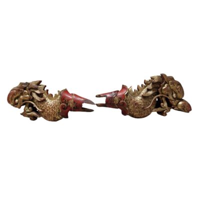 beam supports, eave finials or decorations for ceremonial furniture. Their elongated shape and the cut at the rear end suggest that they were designed to be fitted into or attached to another larger structure. Hire for events, advertising, films and TV series