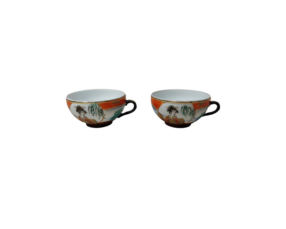 The set comprises two ceramic mugs with an open design and rounded edges, each fitted with a dark-coloured side handle. Available for hire for events, advertising, films and TV series.