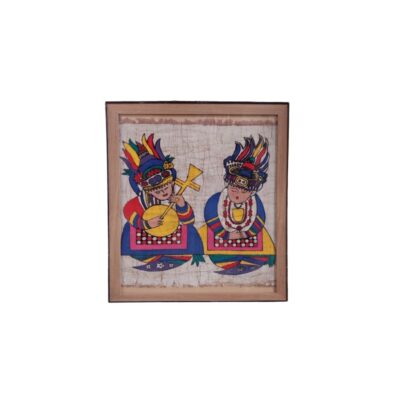 A square-framed artwork, featuring an illustration on fabric depicting two traditional characters wearing colourful headdresses, ornate clothing and musical instruments; available for hire for events, advertising, films and TV series
