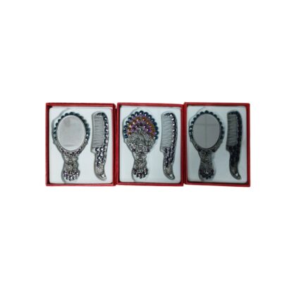 The set comprises three individual red presentation cases, each containing a dressing set consisting of a hand mirror and a metal comb with ornate finishes and beaded inlays. Available for hire for events, advertising, films and TV series.