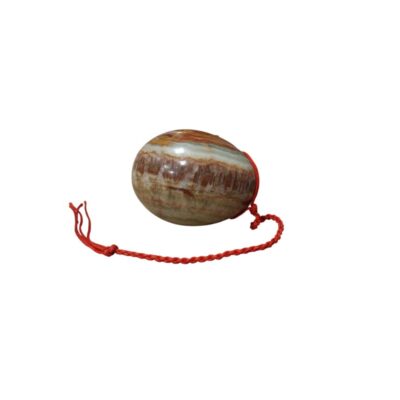 The piece consists of a polished egg carved from natural stone, featuring distinctive veining in shades ranging from brown to greenish-white. Available for hire for events, advertising, films and TV series.